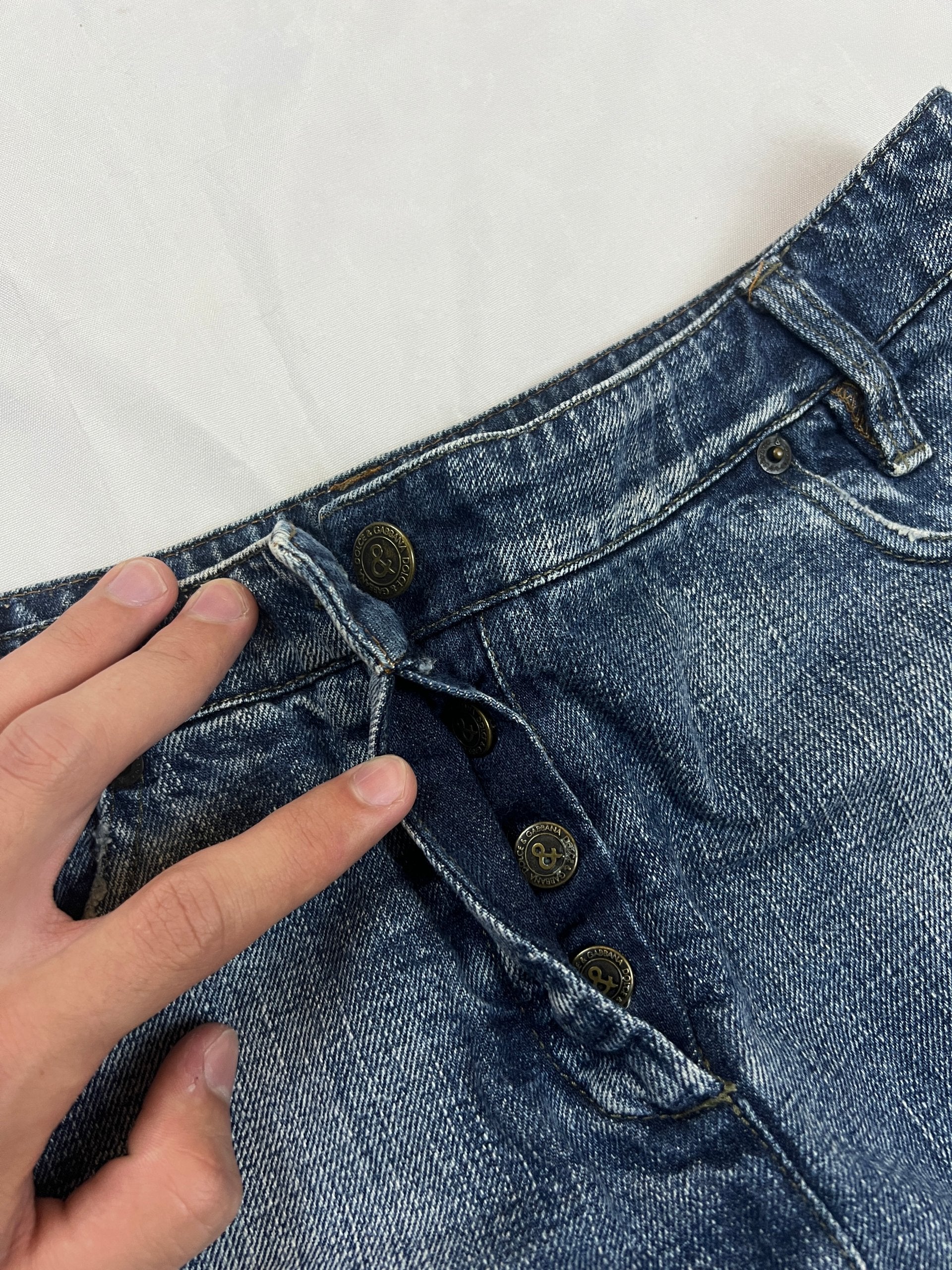 & Other Stories blue denim mini skirt with frayed hem and branded button fly closure