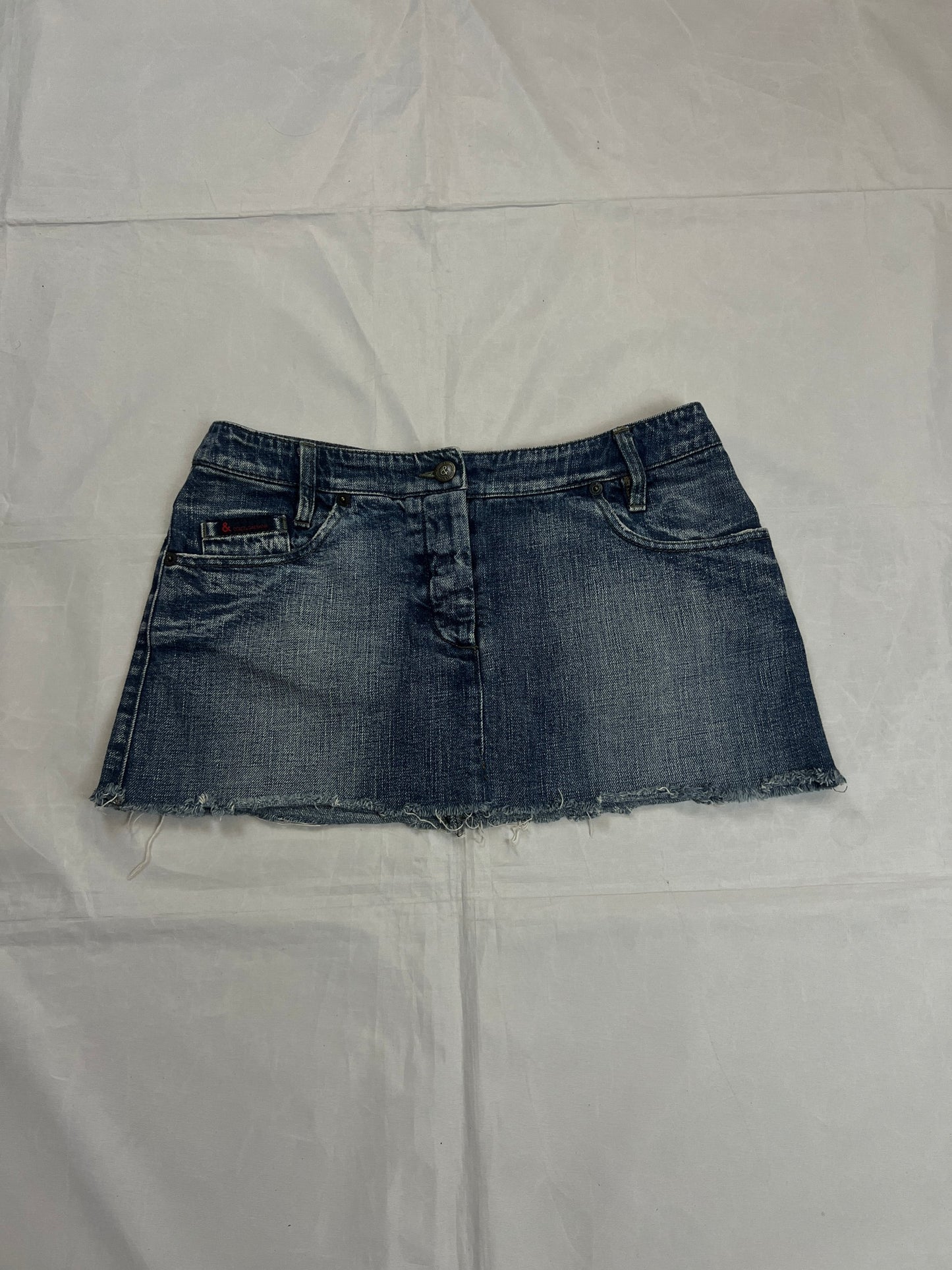 & Other Stories blue denim mini skirt with frayed hem and branded button fly closure