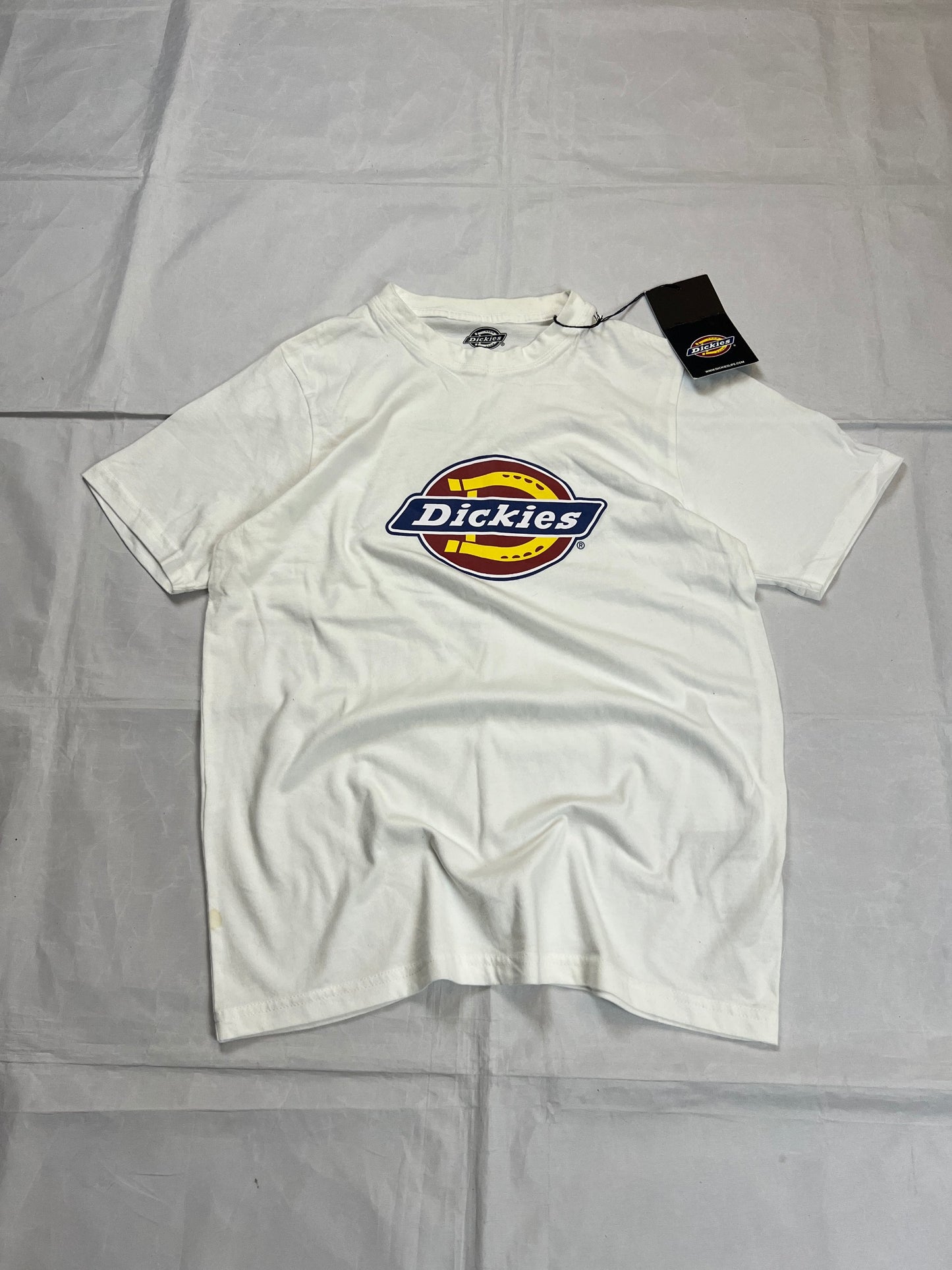 Dickies white t-shirt featuring bold front logo, made from 100% cotton.