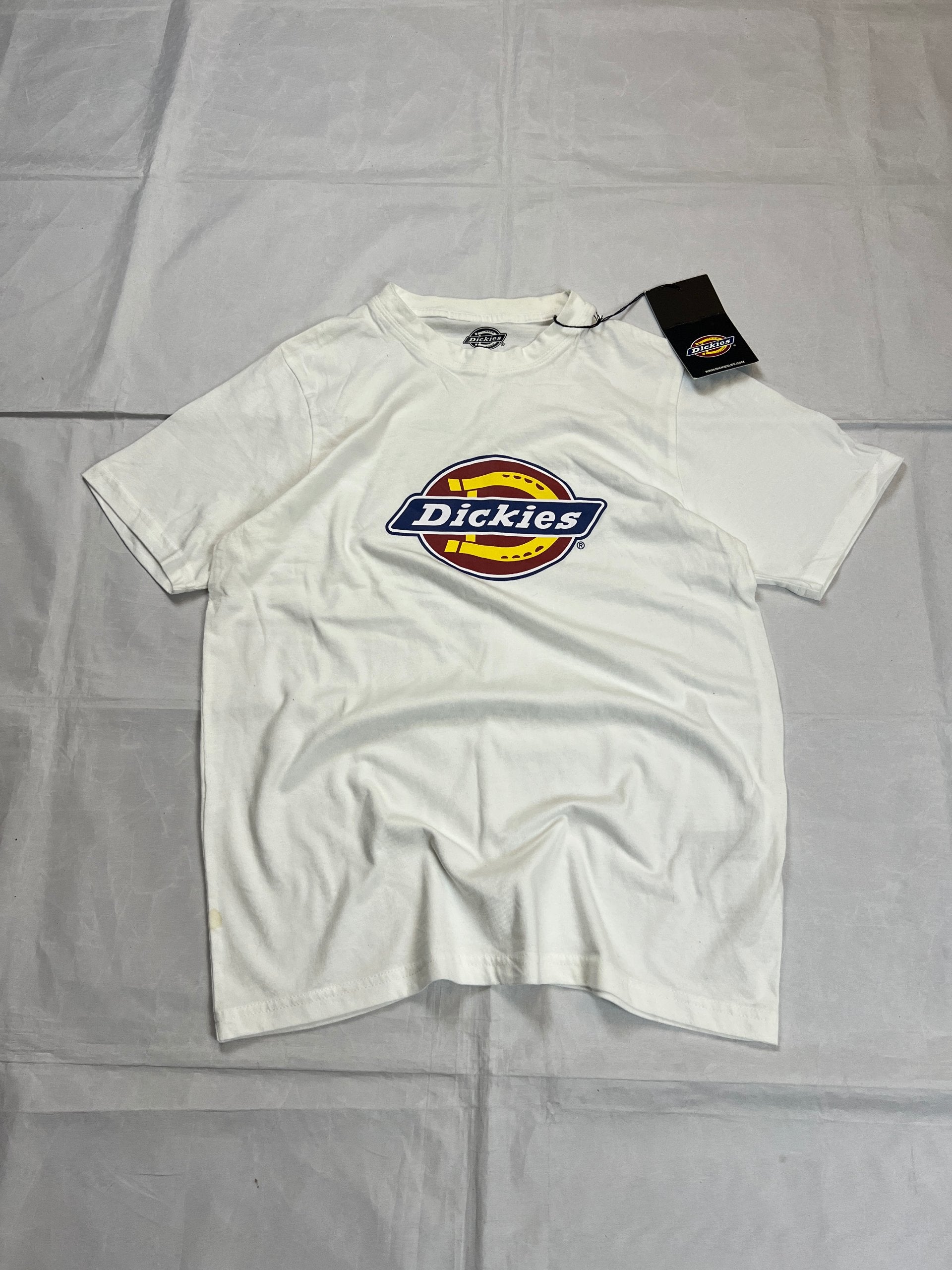 Dickies white t-shirt featuring bold front logo, made from 100% cotton.