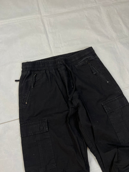 Carhartt black cargo joggers relaxed fit with multiple pockets and elastic cuffs.