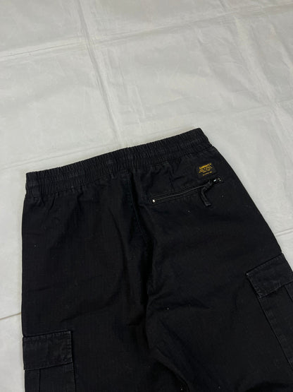 Carhartt black cargo joggers relaxed fit with multiple pockets and elastic cuffs.