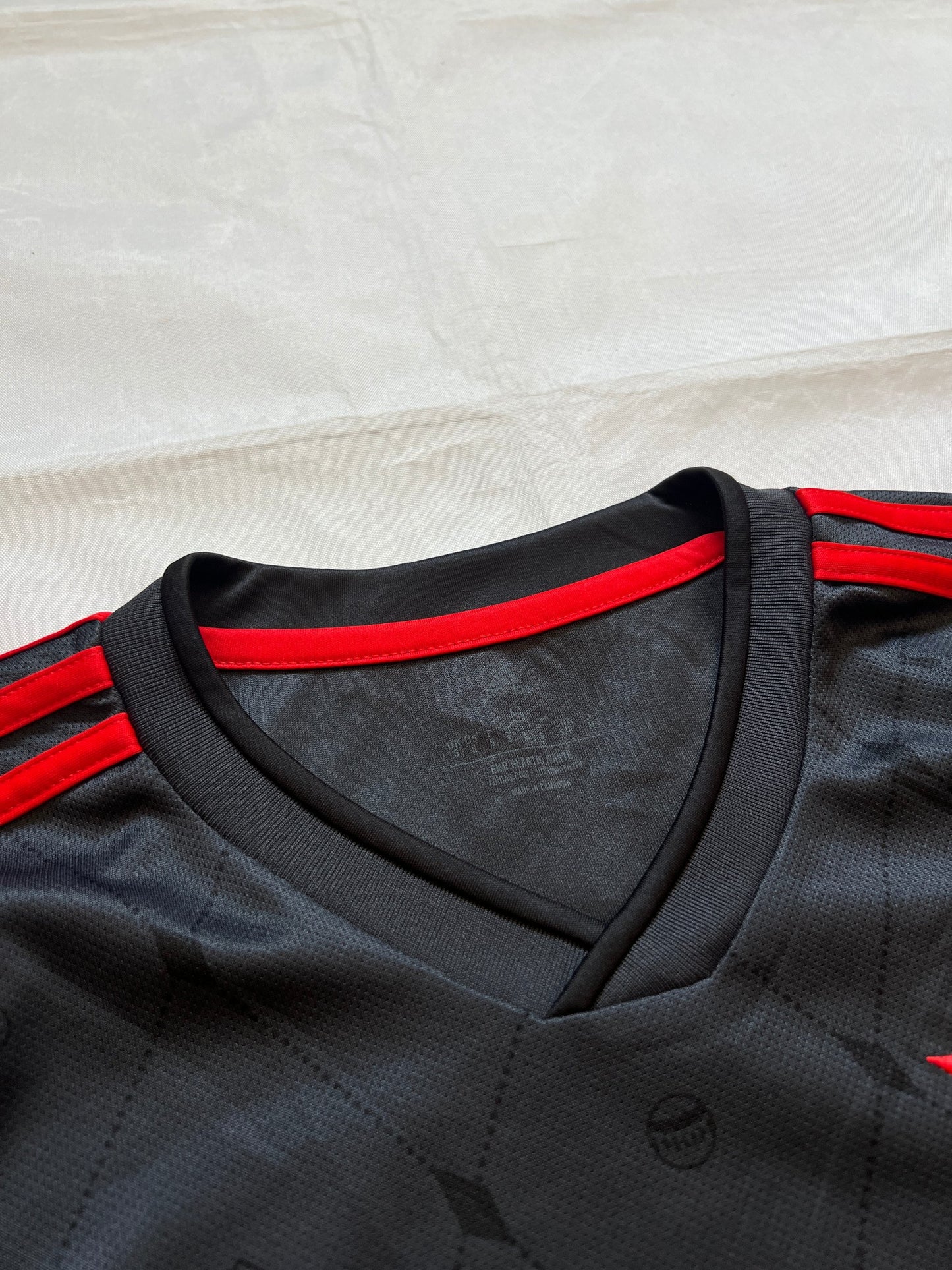 Adidas Bayern Munich black football shirt with red trim, player Davies #19 print, lightweight fabric.
