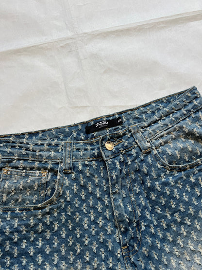 Based NY blue baggy fit denim shorts with distressed pattern and brass rivet details.