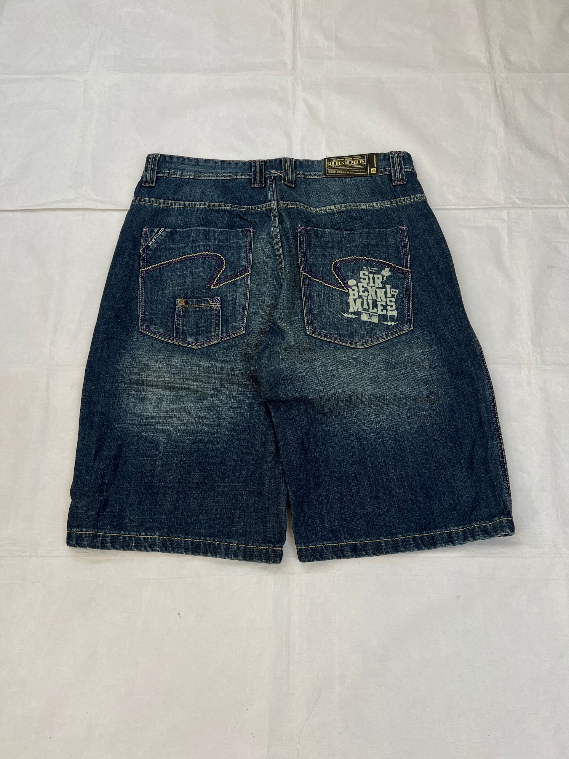 SIR BENNI MILES blue denim shorts with embroidered logos and faded wash, 100% cotton.