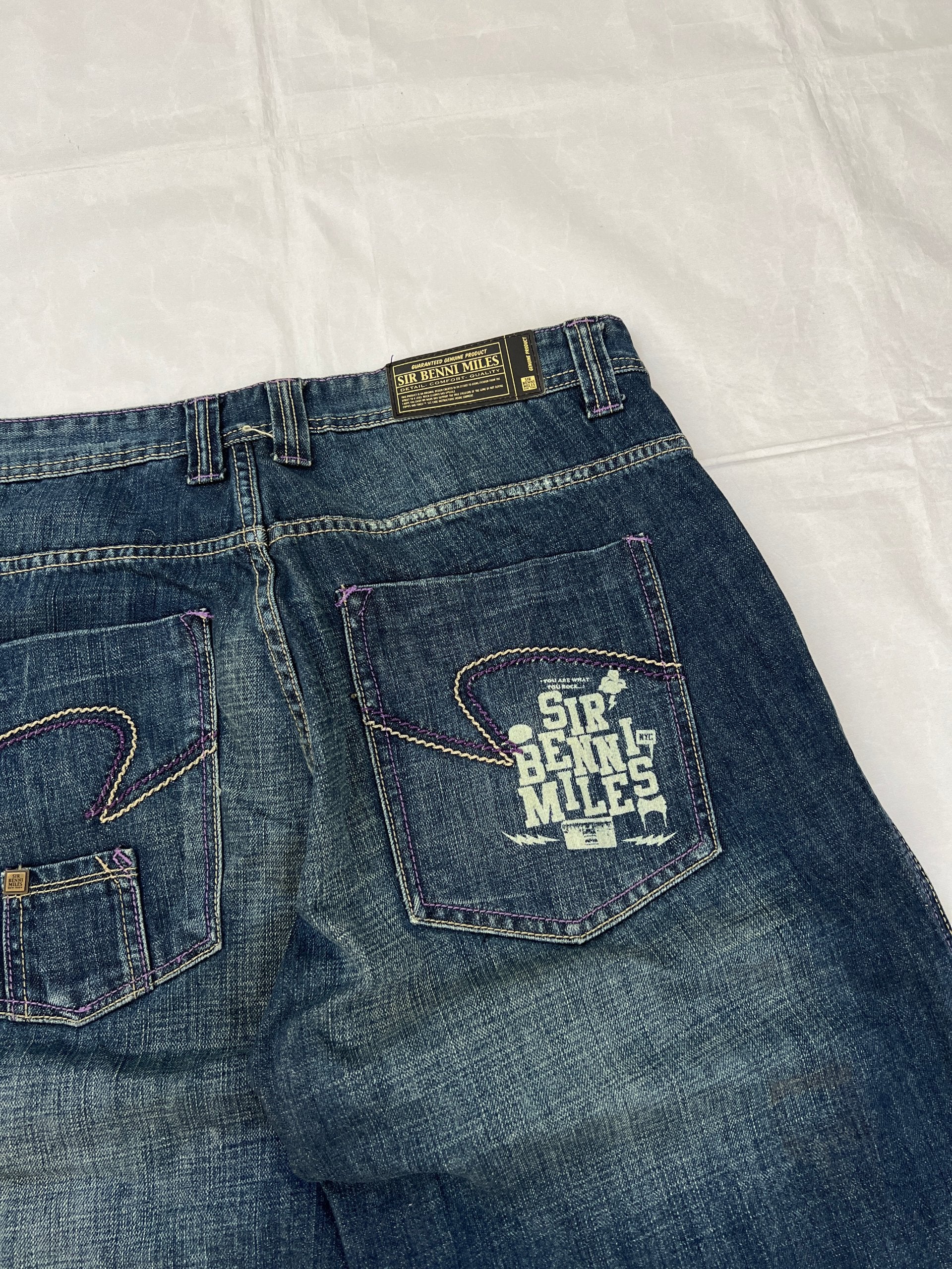 SIR BENNI MILES blue denim shorts with embroidered logos and faded wash, 100% cotton.
