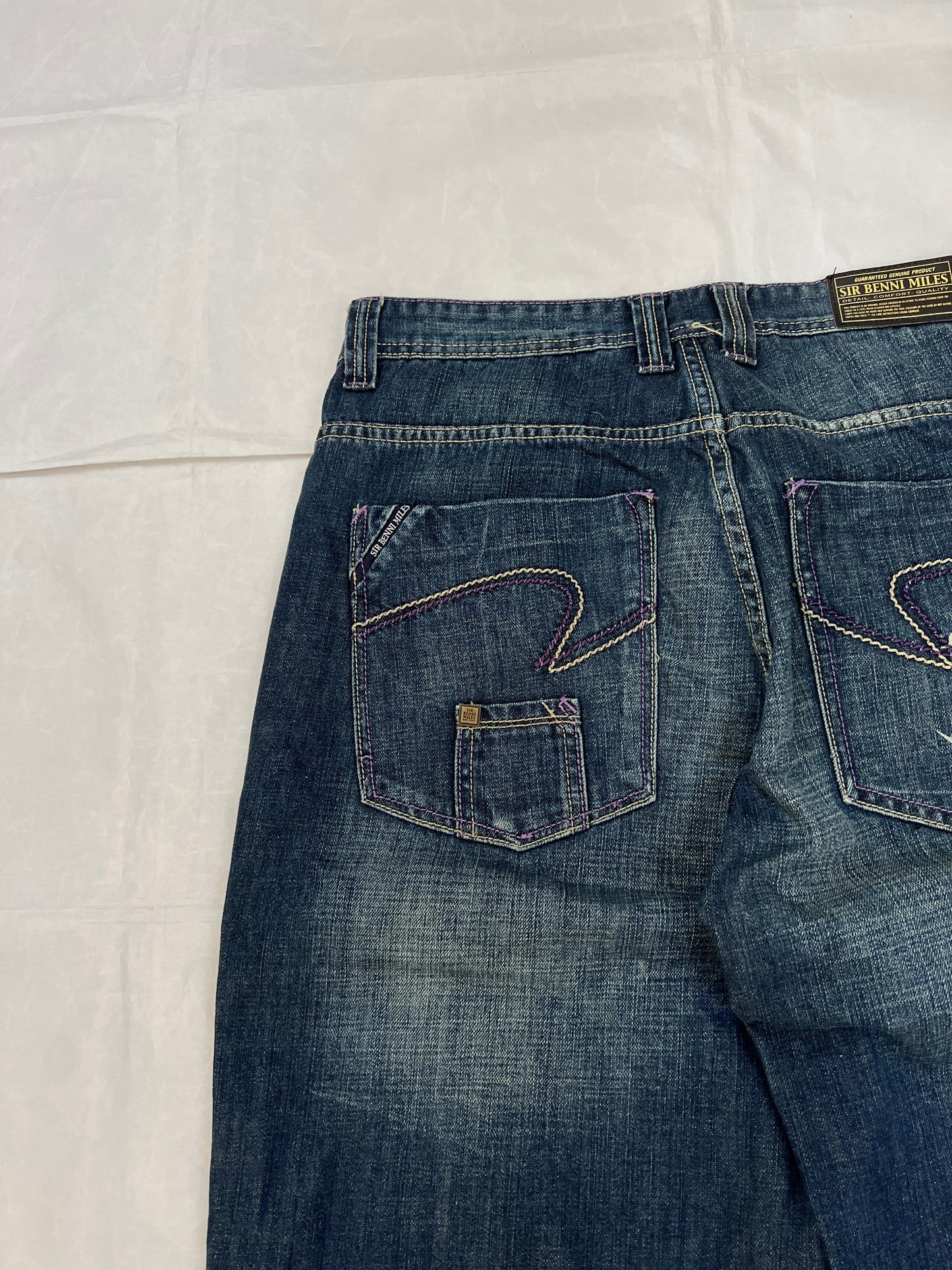 SIR BENNI MILES blue denim shorts with embroidered logos and faded wash, 100% cotton.