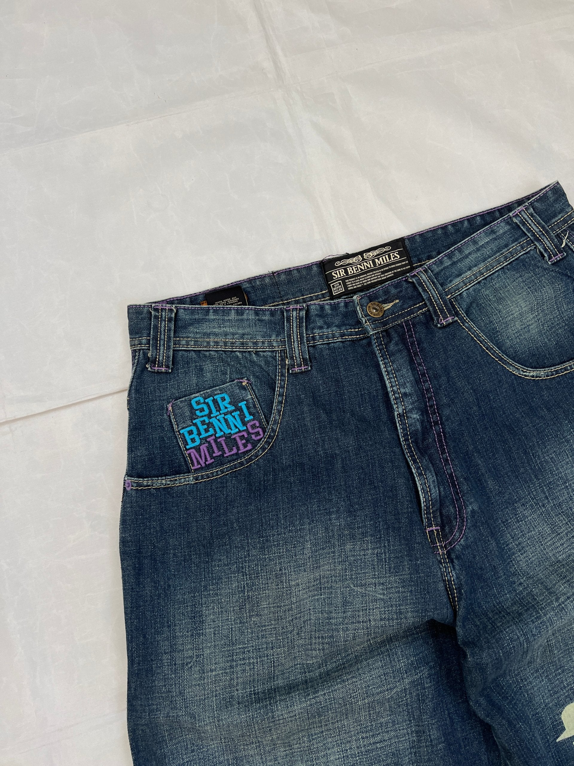 SIR BENNI MILES blue denim shorts with embroidered logos and faded wash, 100% cotton.