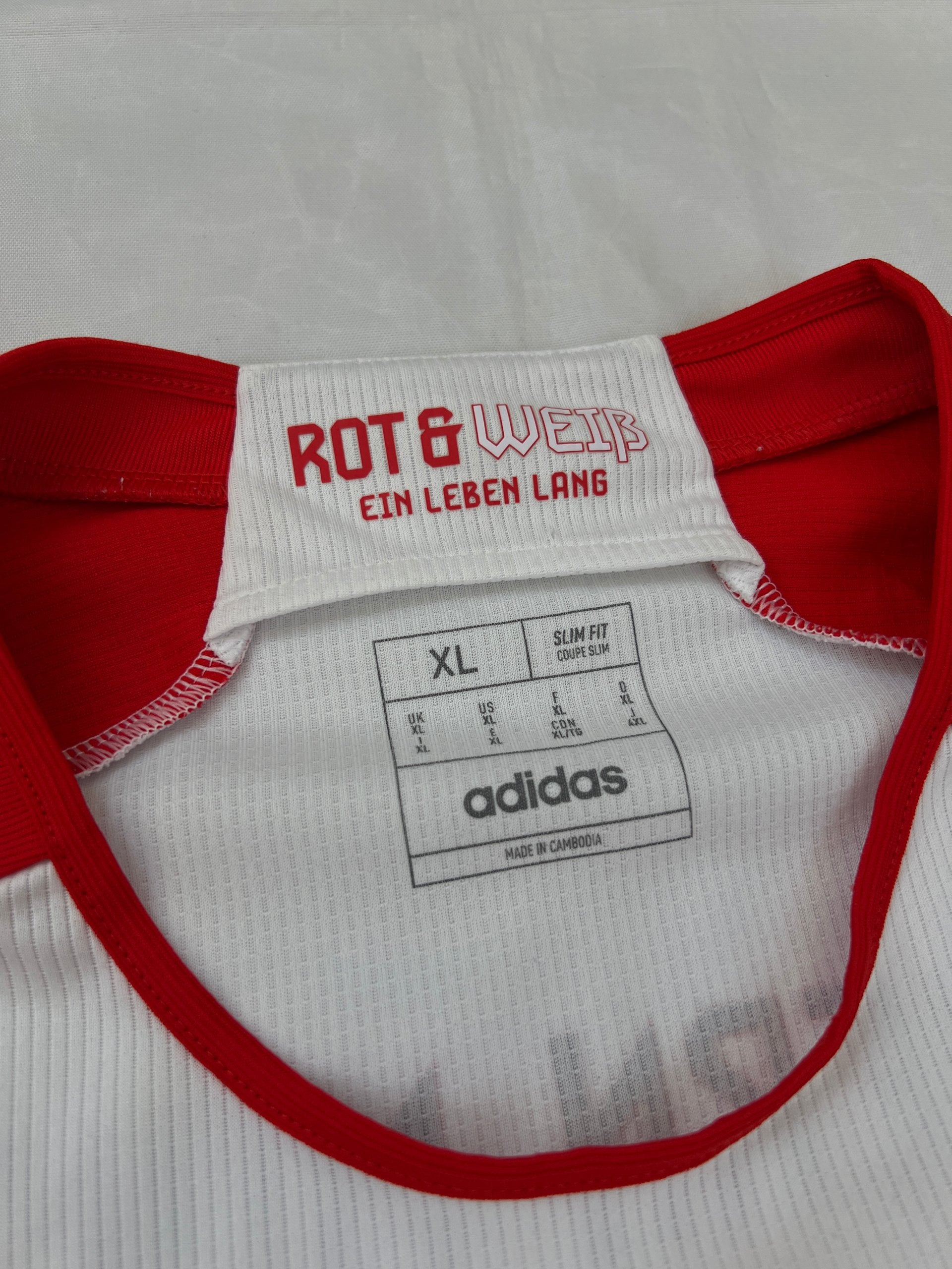 Adidas red and white FC Bayern Munich football jersey, slim fit, AEROREADY technology, 'MIA SAN MIA' detail.