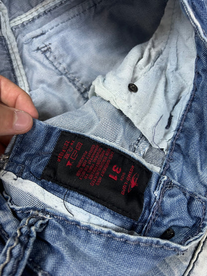 KJM blue denim jeans with white embroidered lion and logo, patchwork stitch detailing.