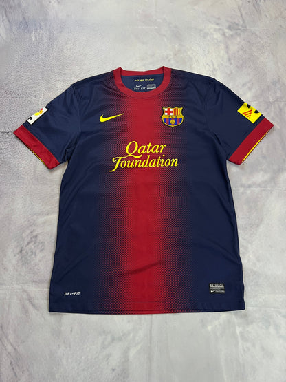 Nike FC Barcelona navy and red football shirt with Qatar Foundation logo and La Liga patches.