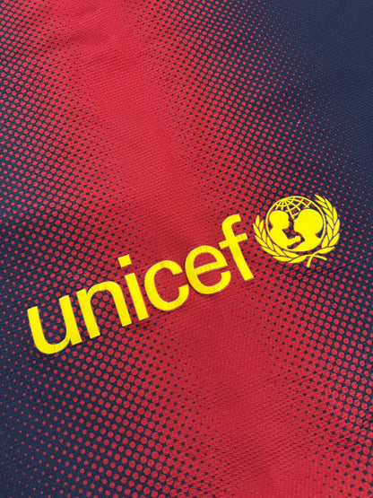 Nike FC Barcelona navy and red football shirt with Qatar Foundation logo and La Liga patches.