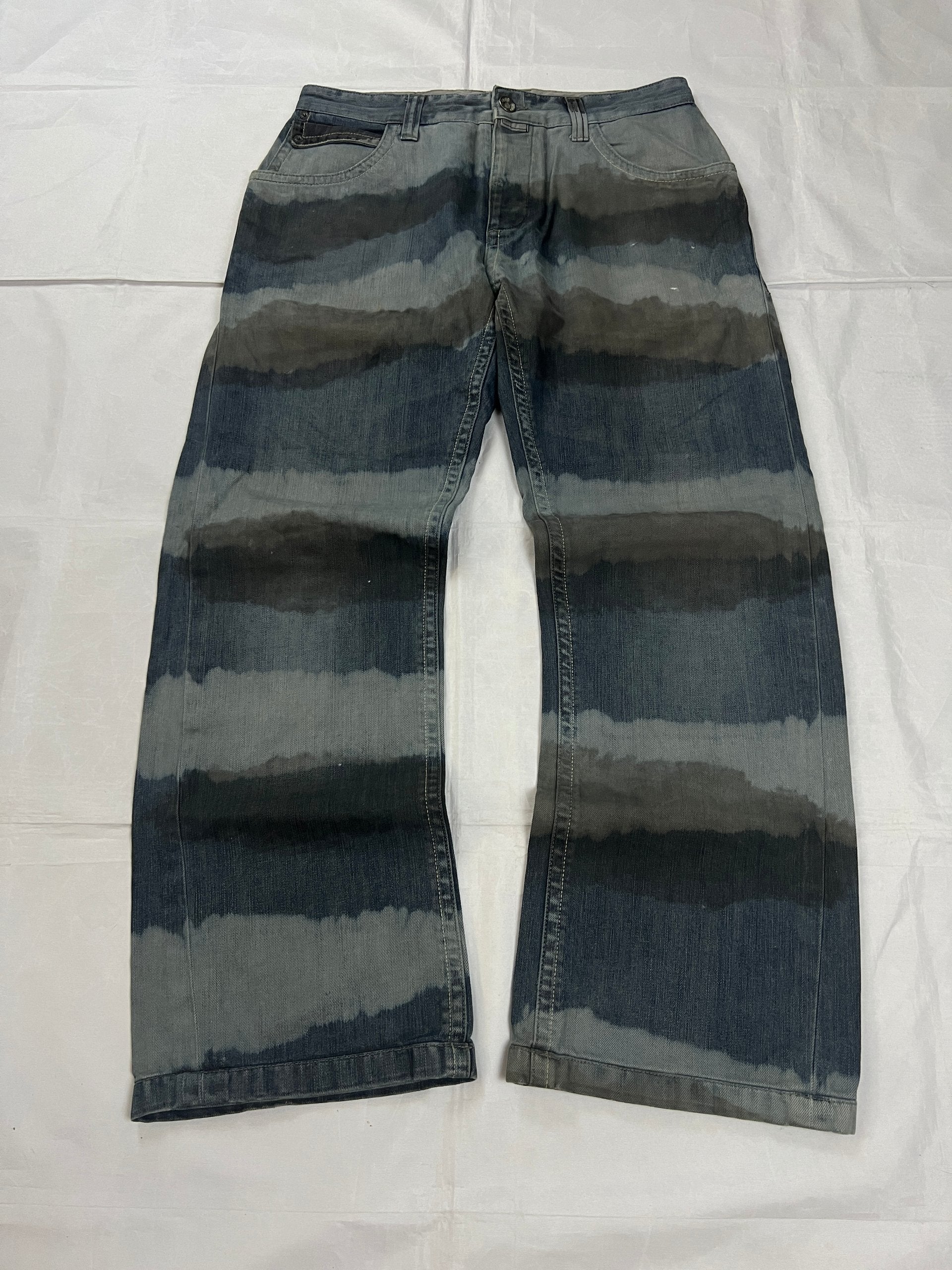 Lee blue and grey striped denim jeans with loose fit and decorative stitching.
