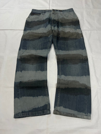 Lee blue and grey striped denim jeans with loose fit and decorative stitching.