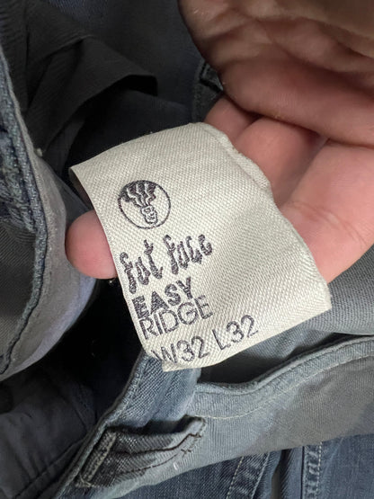 Lee blue and grey striped denim jeans with loose fit and decorative stitching.