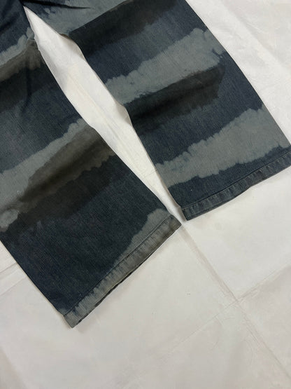Lee blue and grey striped denim jeans with loose fit and decorative stitching.