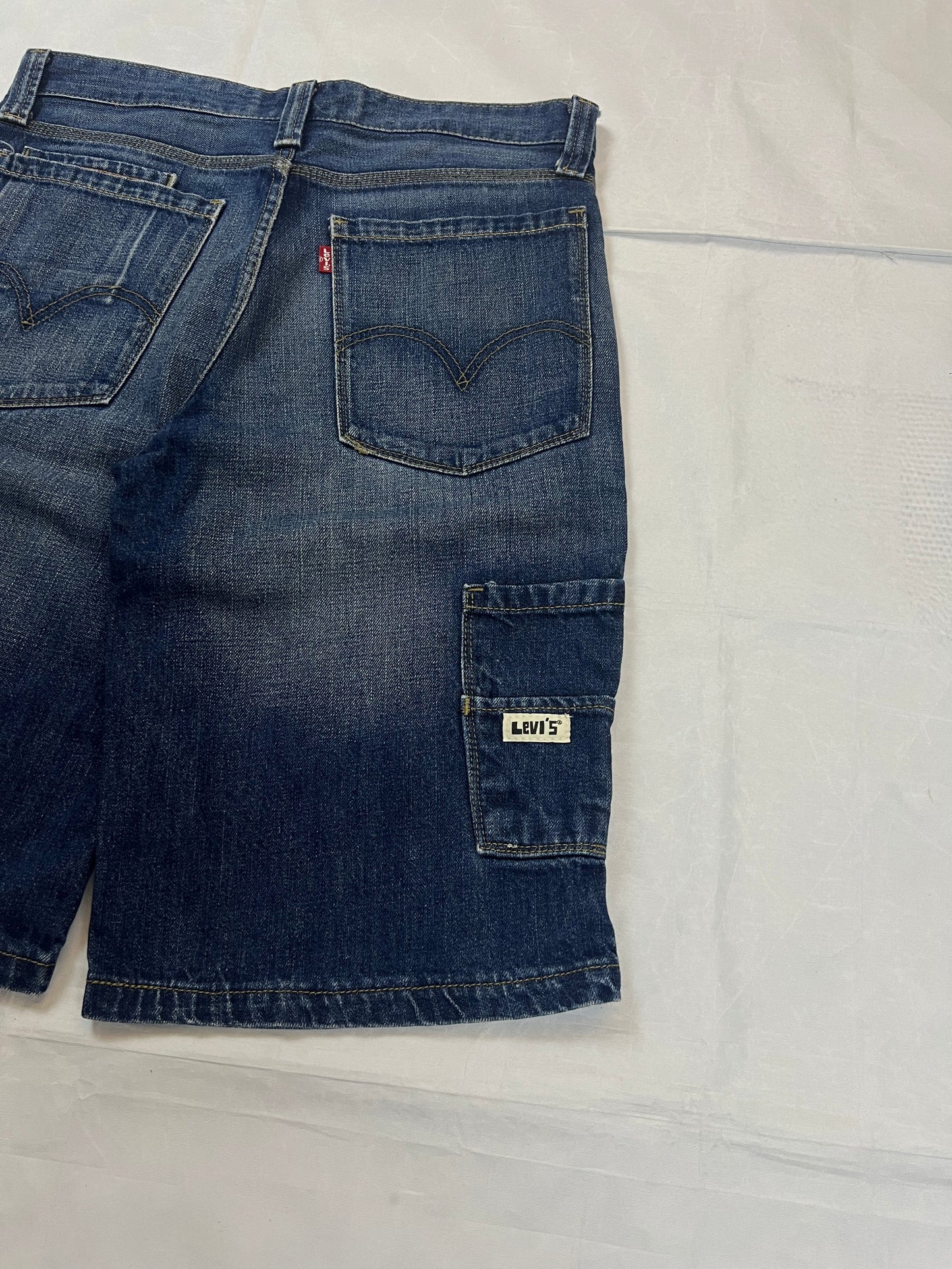 Levi's blue denim shorts classic fit five-pocket style with branded patch.