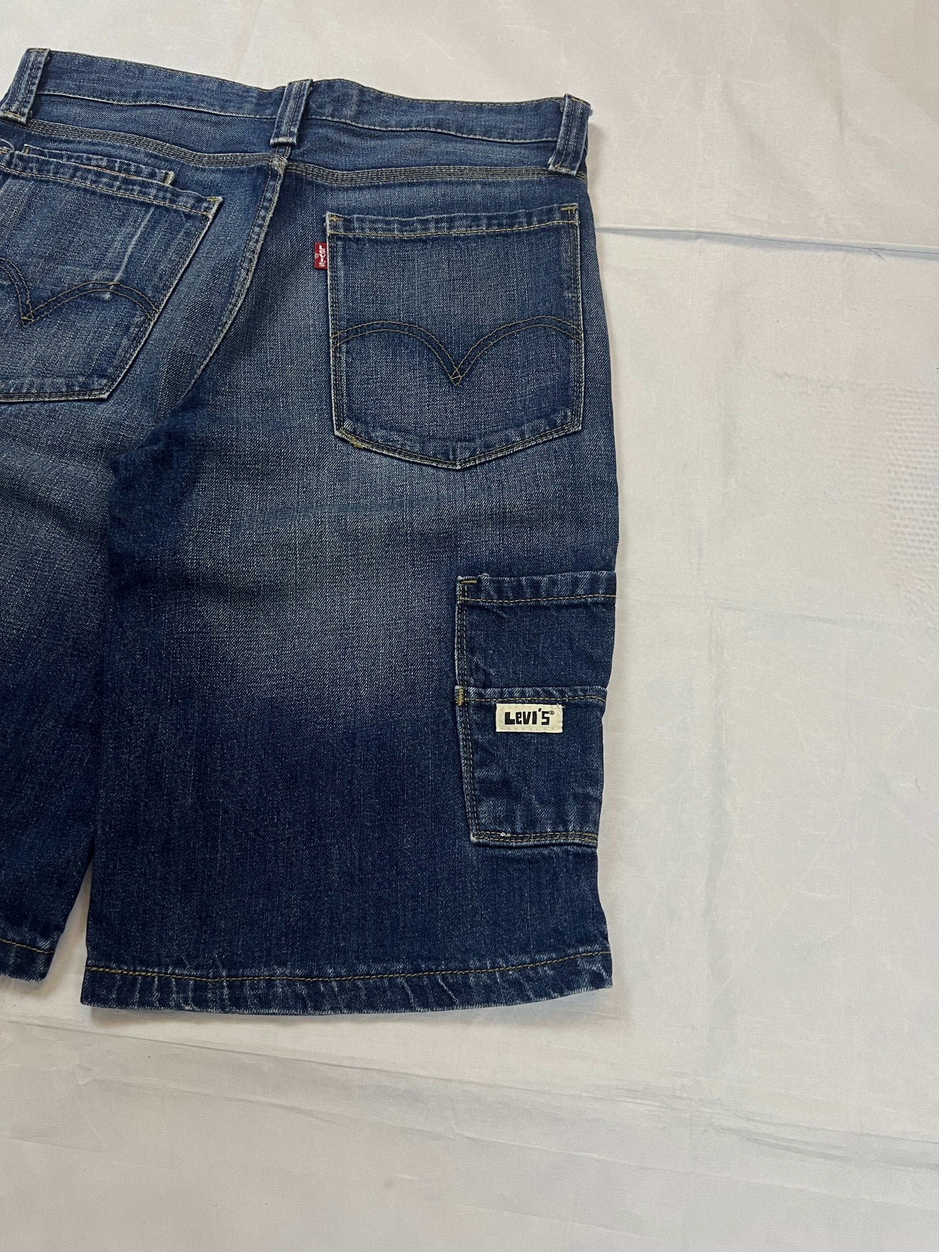 Levi's blue denim shorts classic fit five-pocket style with branded patch.