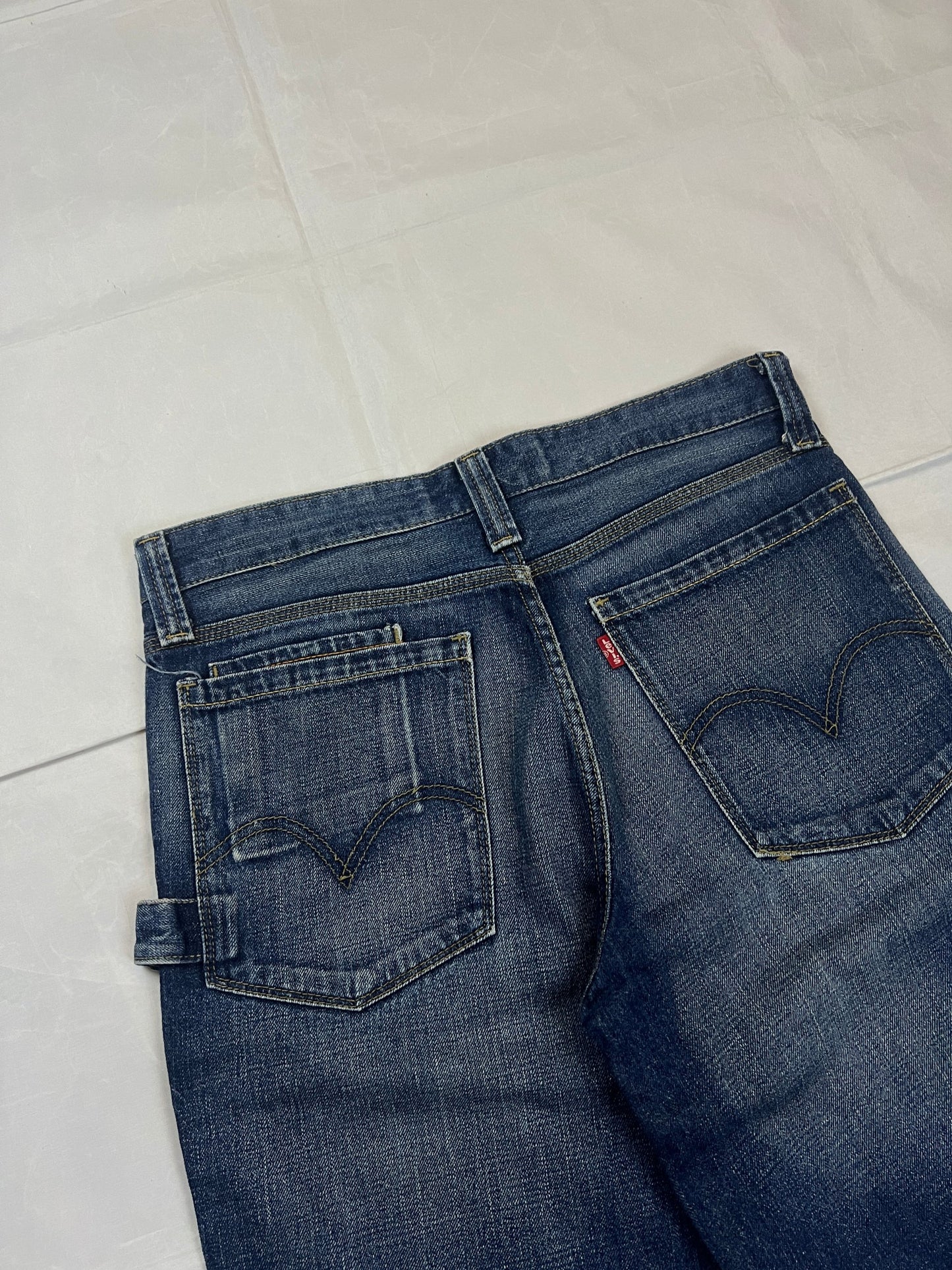 Levi's blue denim shorts classic fit five-pocket style with branded patch.