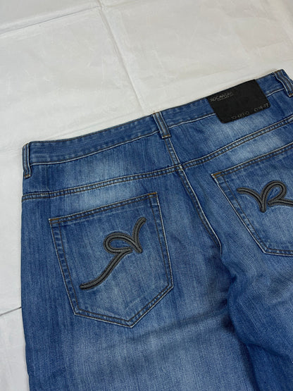 Rocawear blue denim shorts W38 five-pocket design with embroidered back pockets and branded label.