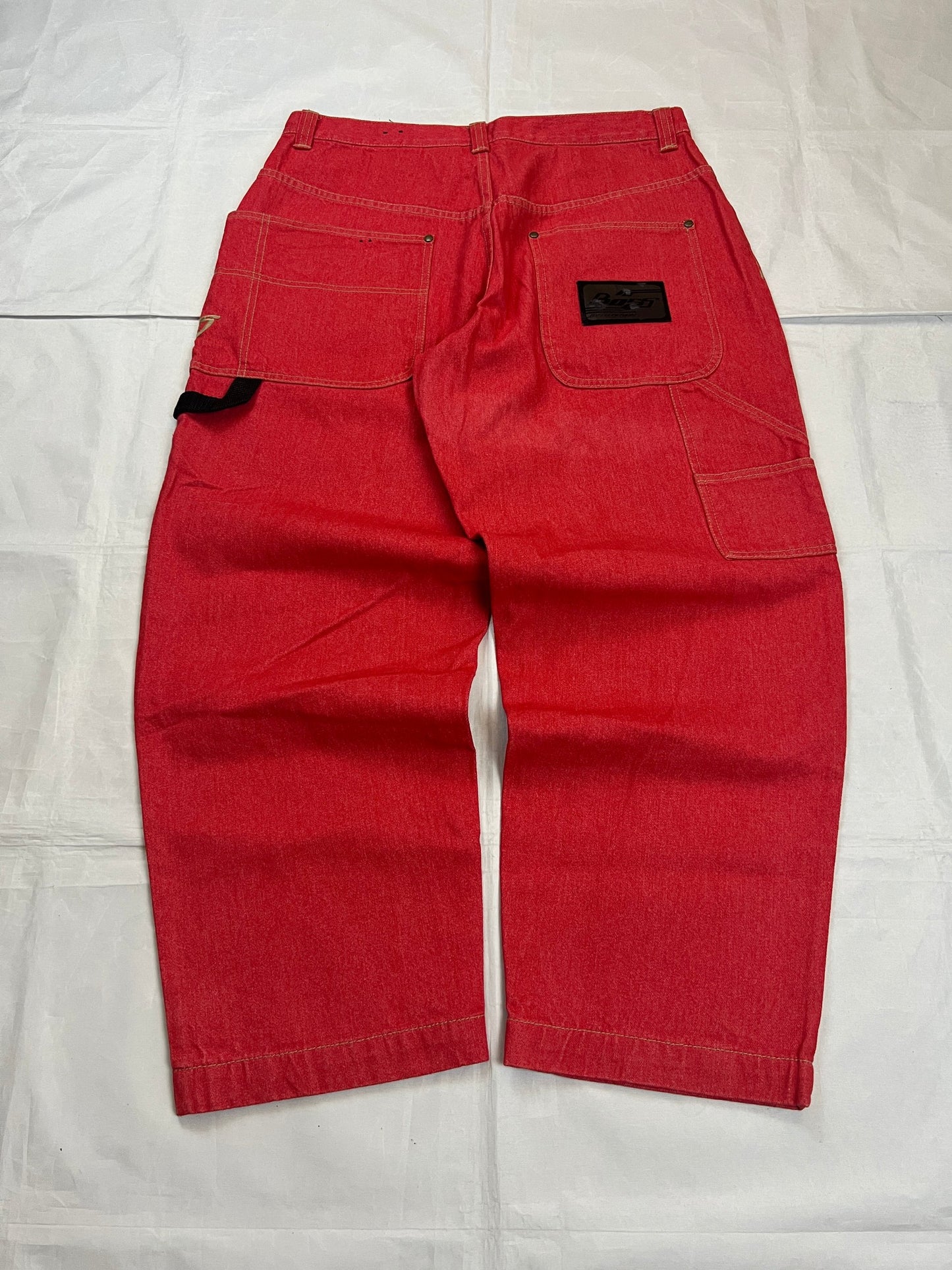 BOSS red carpenter jeans 100% cotton with yellow stitching and logo detailing.