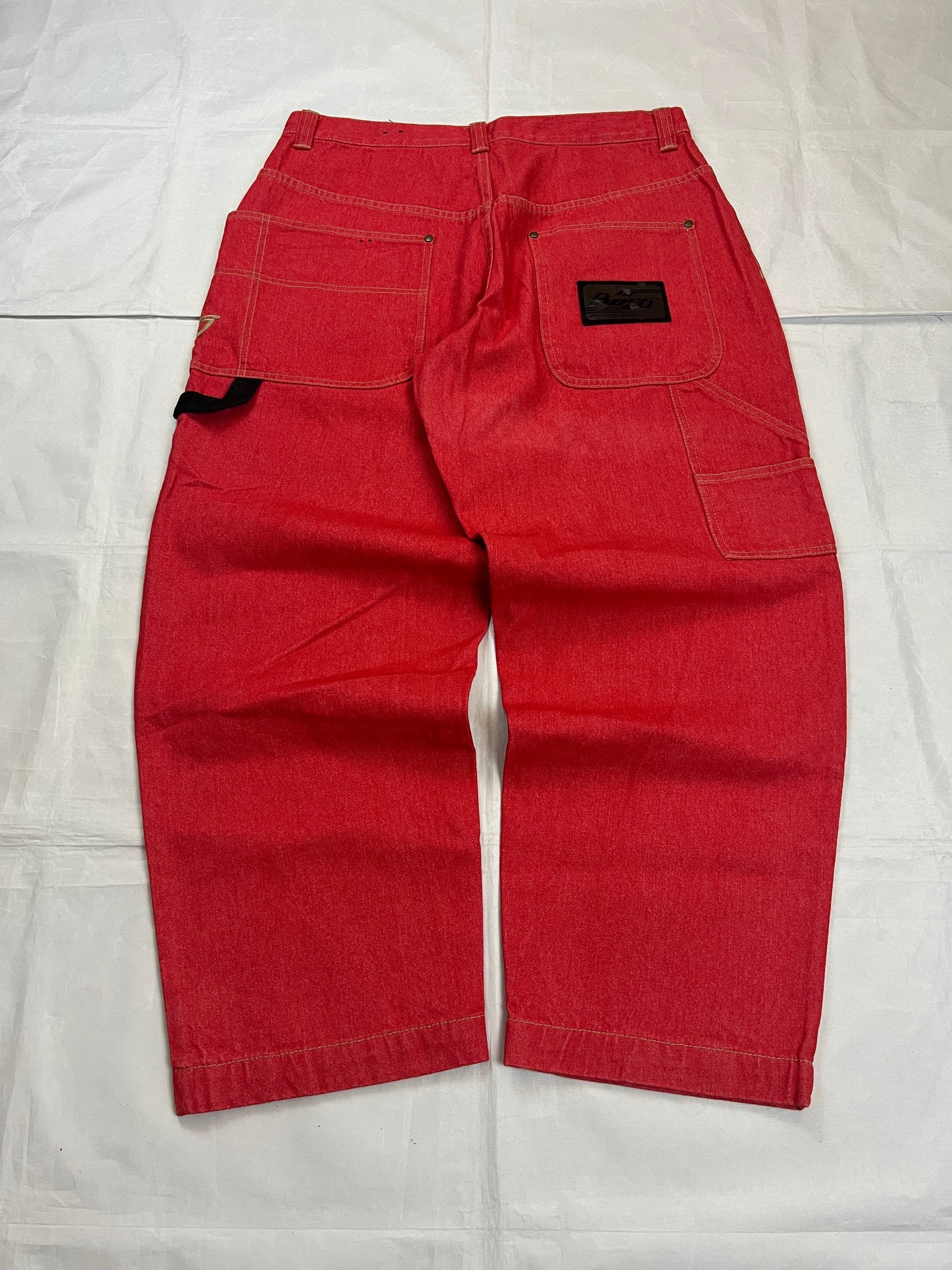 BOSS red carpenter jeans 100% cotton with yellow stitching and logo detailing.