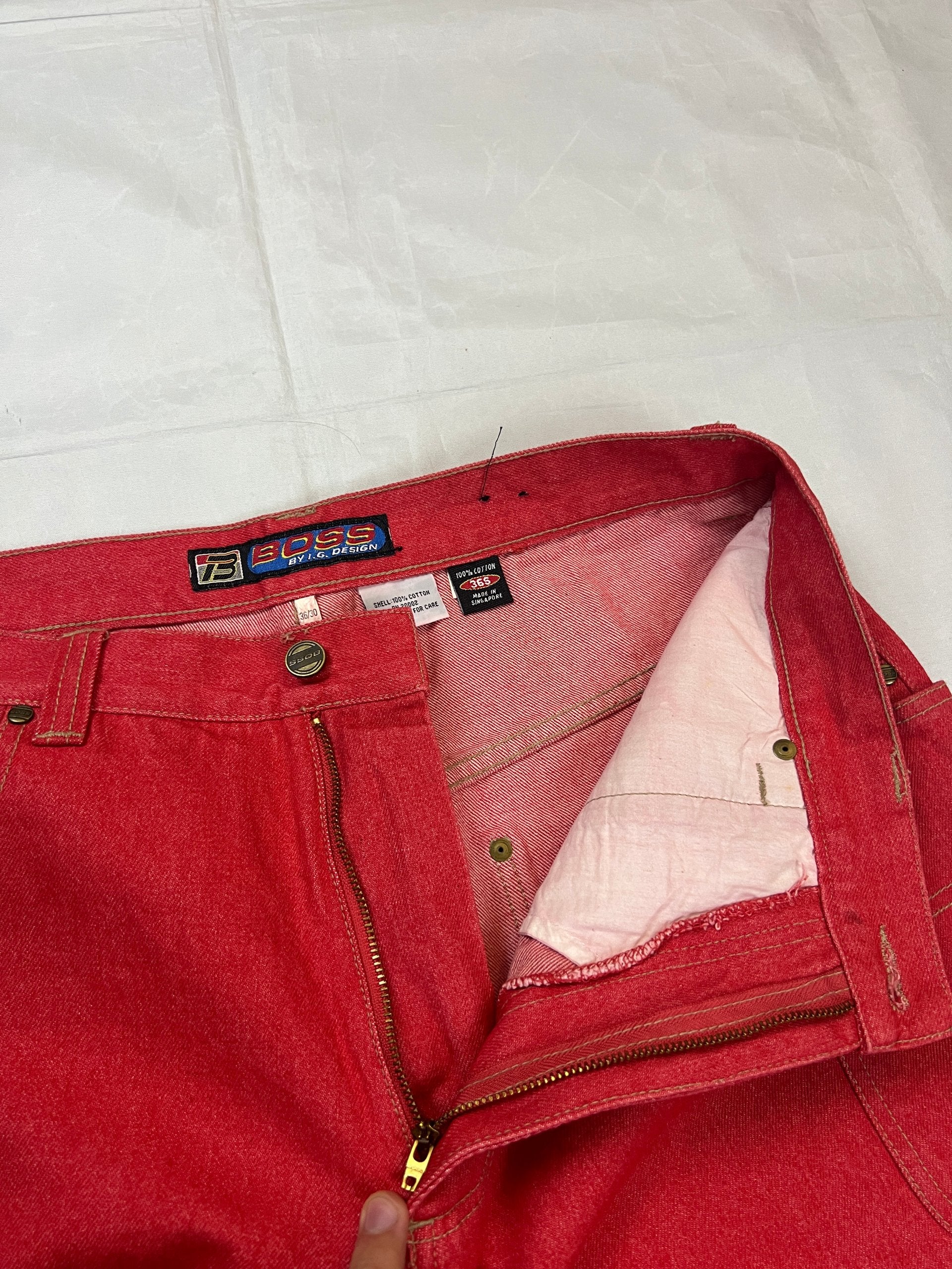 BOSS red carpenter jeans 100% cotton with yellow stitching and logo detailing.