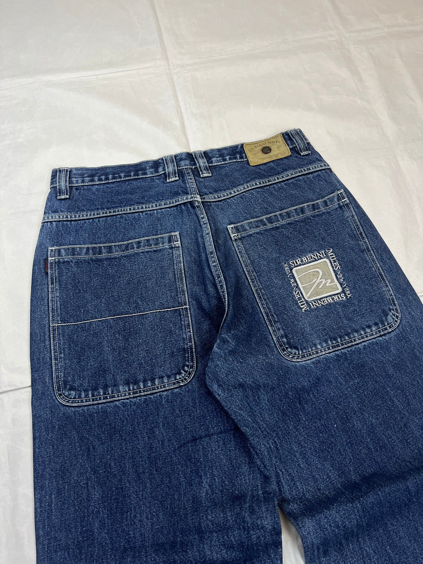 SIR BENNI MILES blue wide-leg jeans distressed with rips, branded back pockets, 100% cotton.