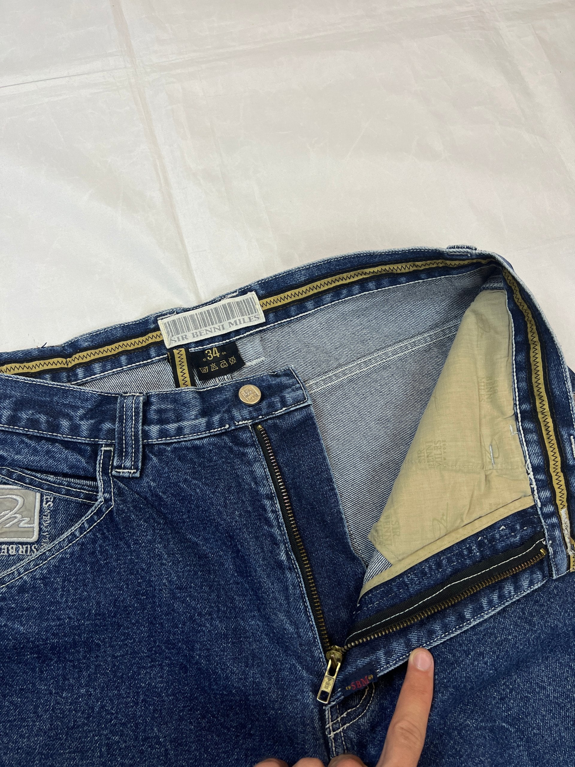 SIR BENNI MILES blue straight jeans 34 with logo embroidery and distressed details.