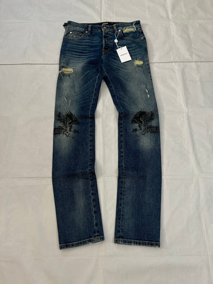 Just Cavalli blue distressed denim jeans UK 10 with black eagle prints on knees.