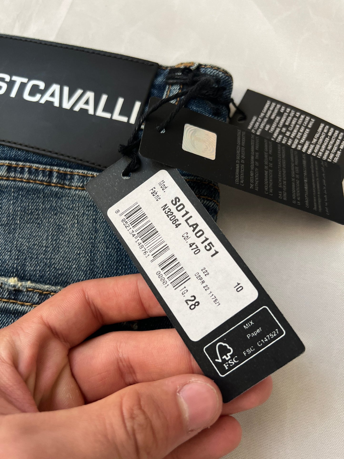 Just Cavalli blue distressed denim jeans UK 10 with black eagle prints on knees.