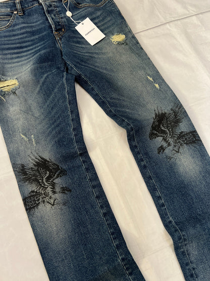Just Cavalli blue distressed denim jeans UK 10 with black eagle prints on knees.