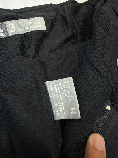 Nike black snow pants with ACG and Gore-Tex logos, adjustable waist, zippered vents.