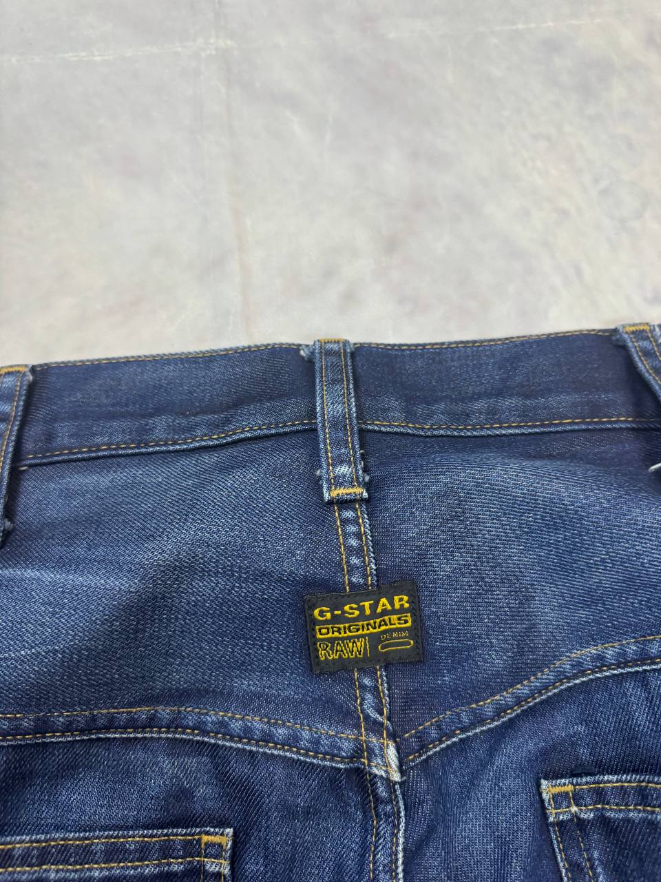 G-Star Raw blue denim 5620 3D Loose jeans with branded button and back patch.