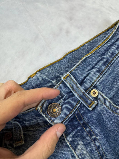 Levi's blue denim jeans with classic five-pocket design and iconic patch on waistband.