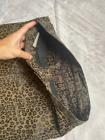 Iceberg brown leopard print trousers with front pockets and metal button closure.