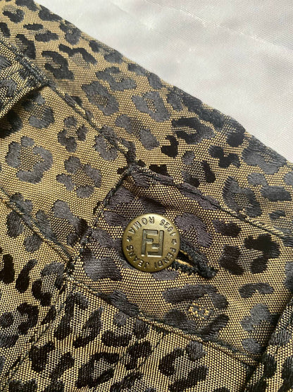 Iceberg brown leopard print trousers with front pockets and metal button closure.