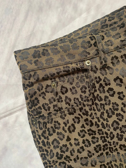 Iceberg brown leopard print trousers with front pockets and metal button closure.