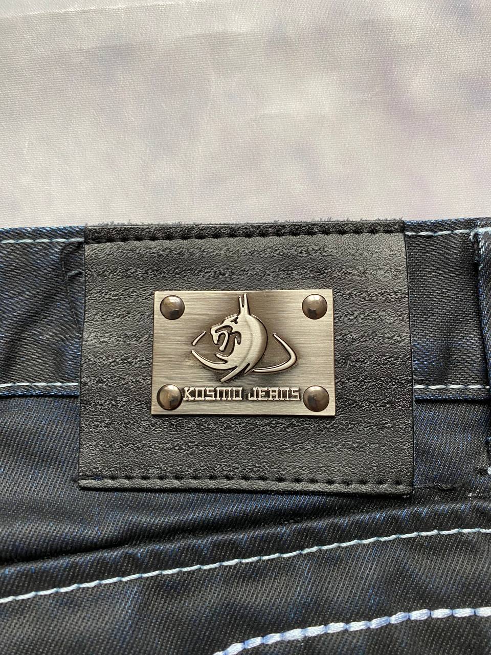 K&M black jeans size 38 with detailed white stitching and metallic stud accents.