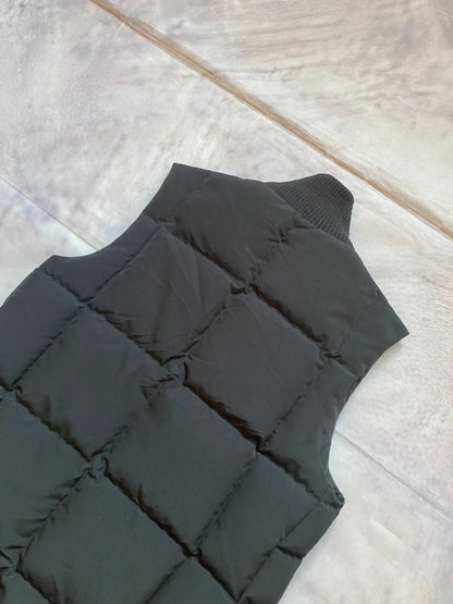 Ralph Lauren black puffer gilet vest with brown zippered pockets and ribbed neck.