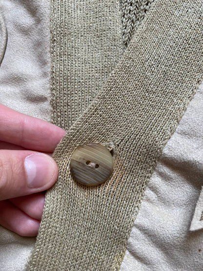 Kansai O2 beige knitted cardigan with embroidered bird detail and fabric patches.