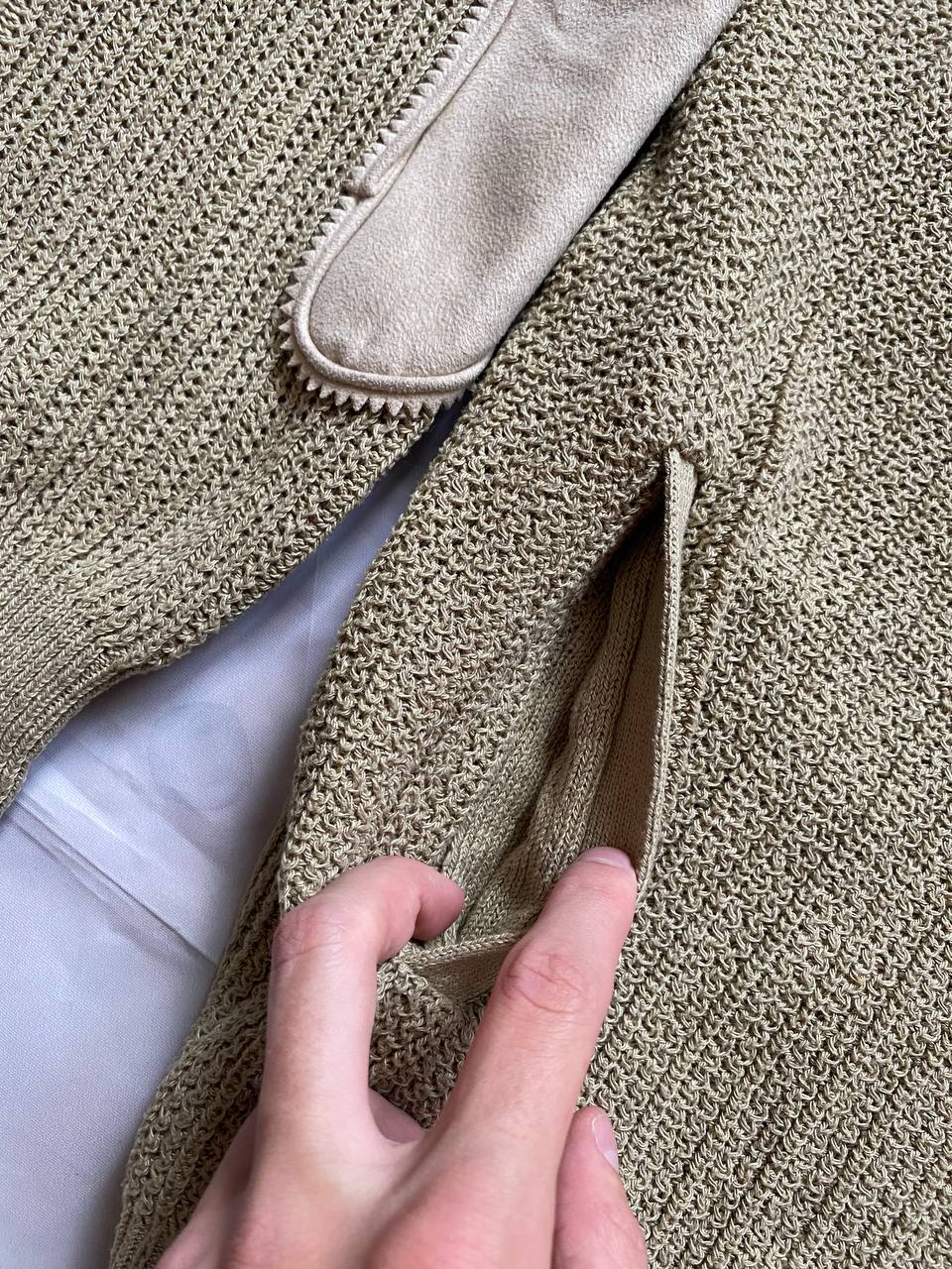 Kansai O2 beige knitted cardigan with embroidered bird detail and fabric patches.