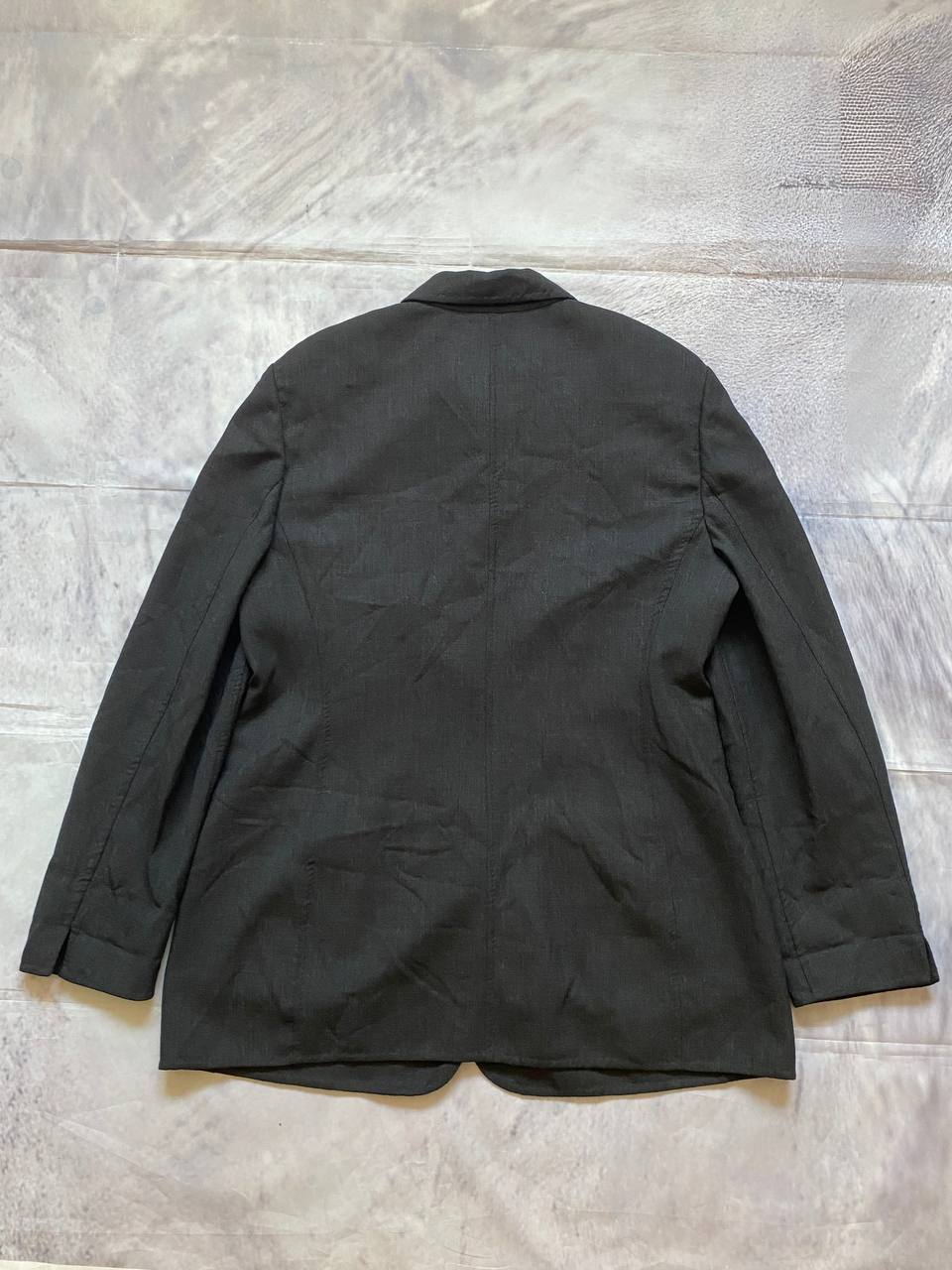 Beams black cotton linen blazer with padded shoulders, three-button front, and slit cuff detail.