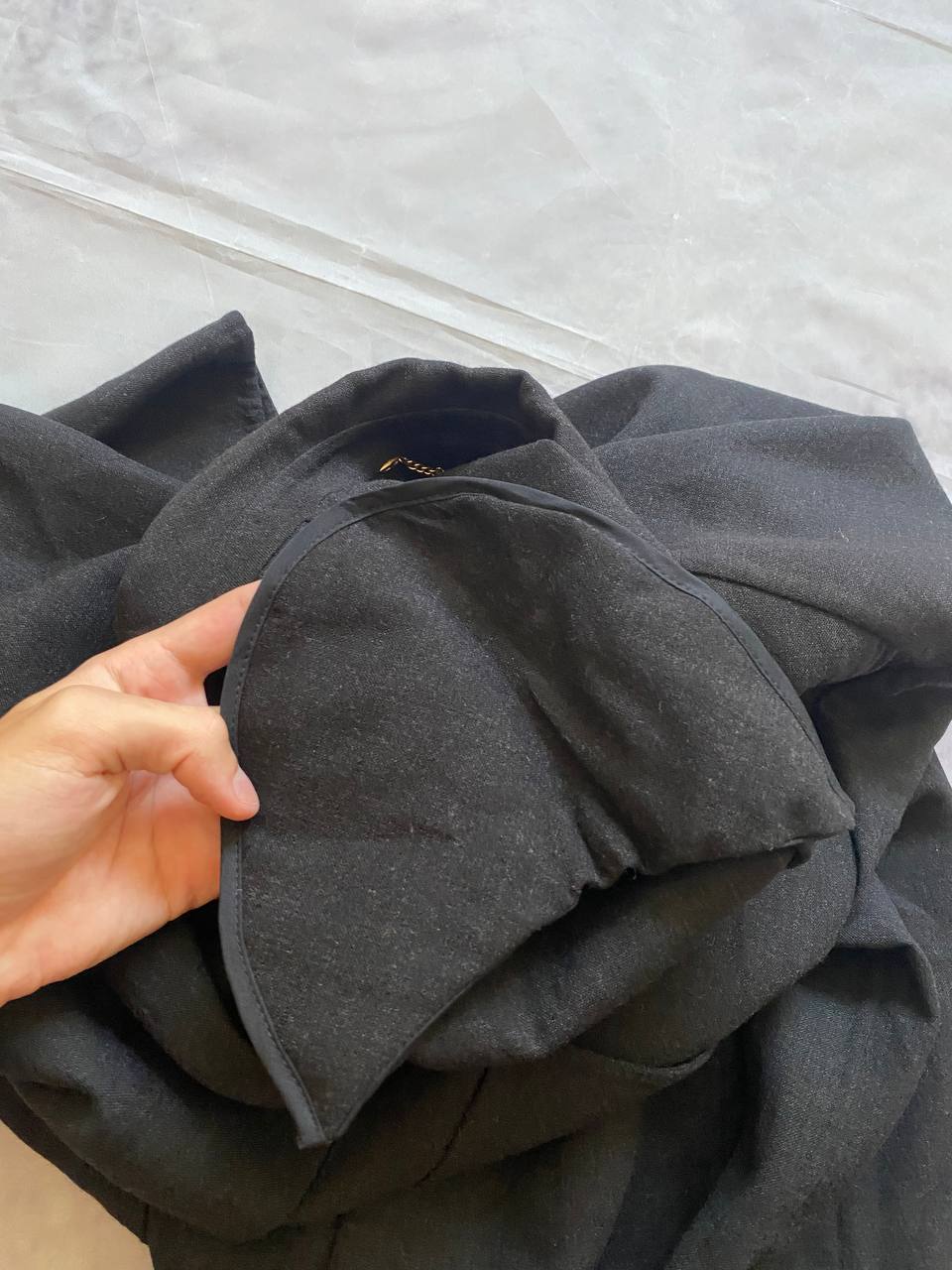 Beams black cotton linen blazer with padded shoulders, three-button front, and slit cuff detail.