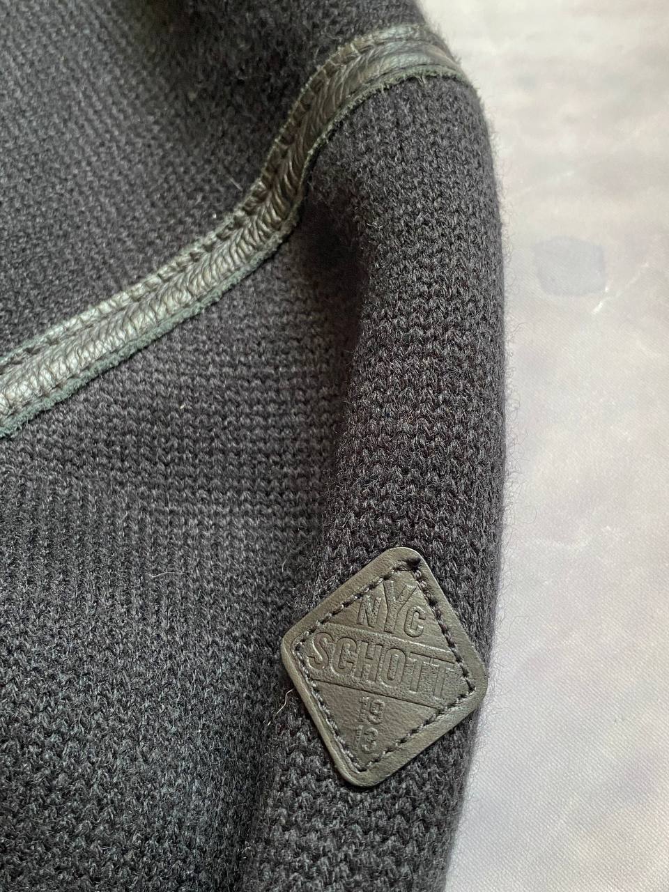 Schott black hoodie with sherpa lining, leather trim, size XL, made in USA.
