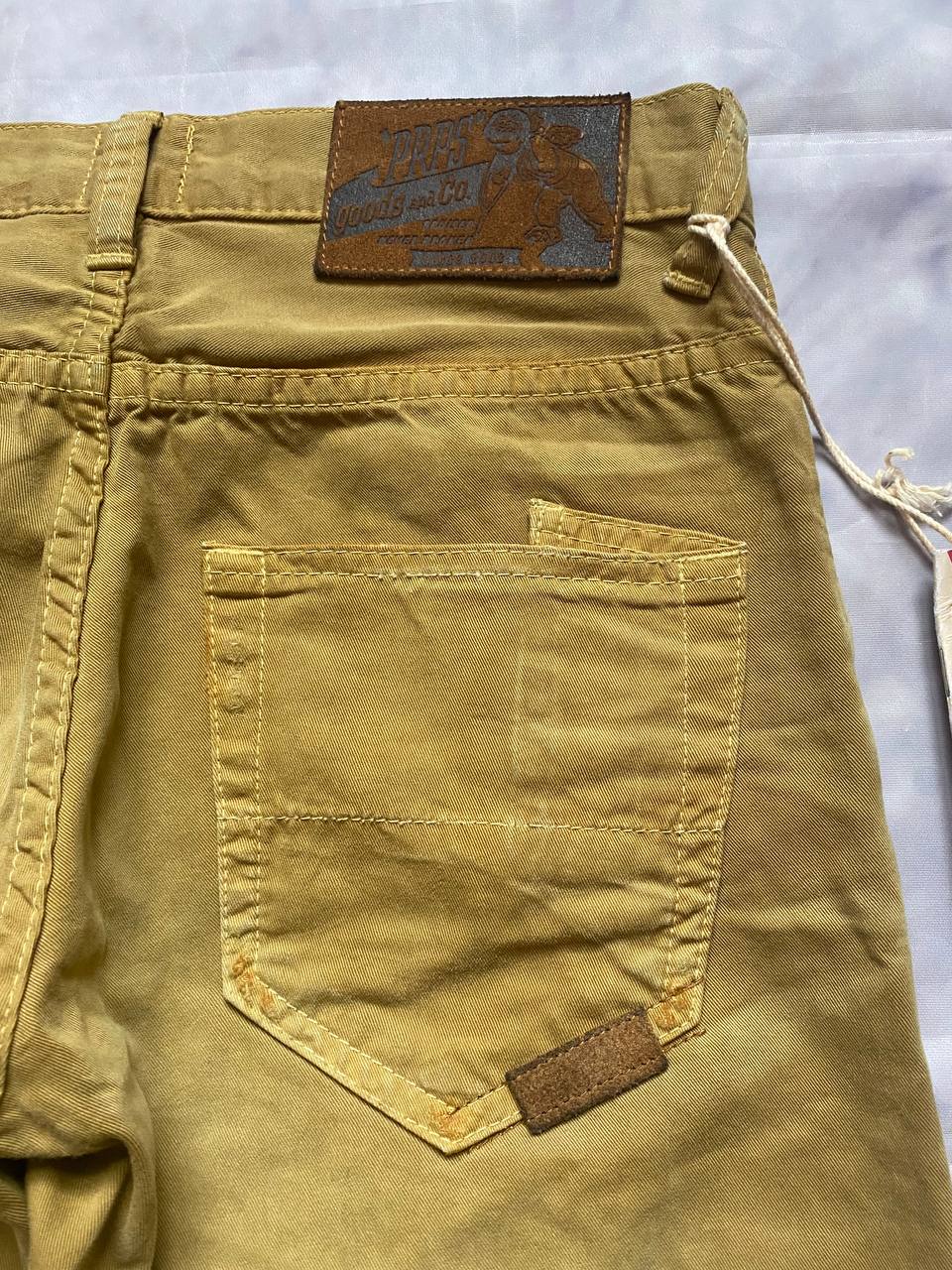 Prps brown cotton trousers with leather logo label and classic 5-pocket styling.
