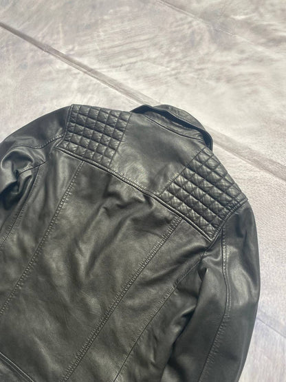 All Saints black quilted leather biker jacket with zippered pockets and adjustable cuffs.