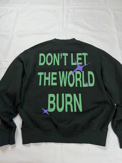 Heron Preston black graphic crewneck sweatshirt with white 'HERON' text and orange label patch.