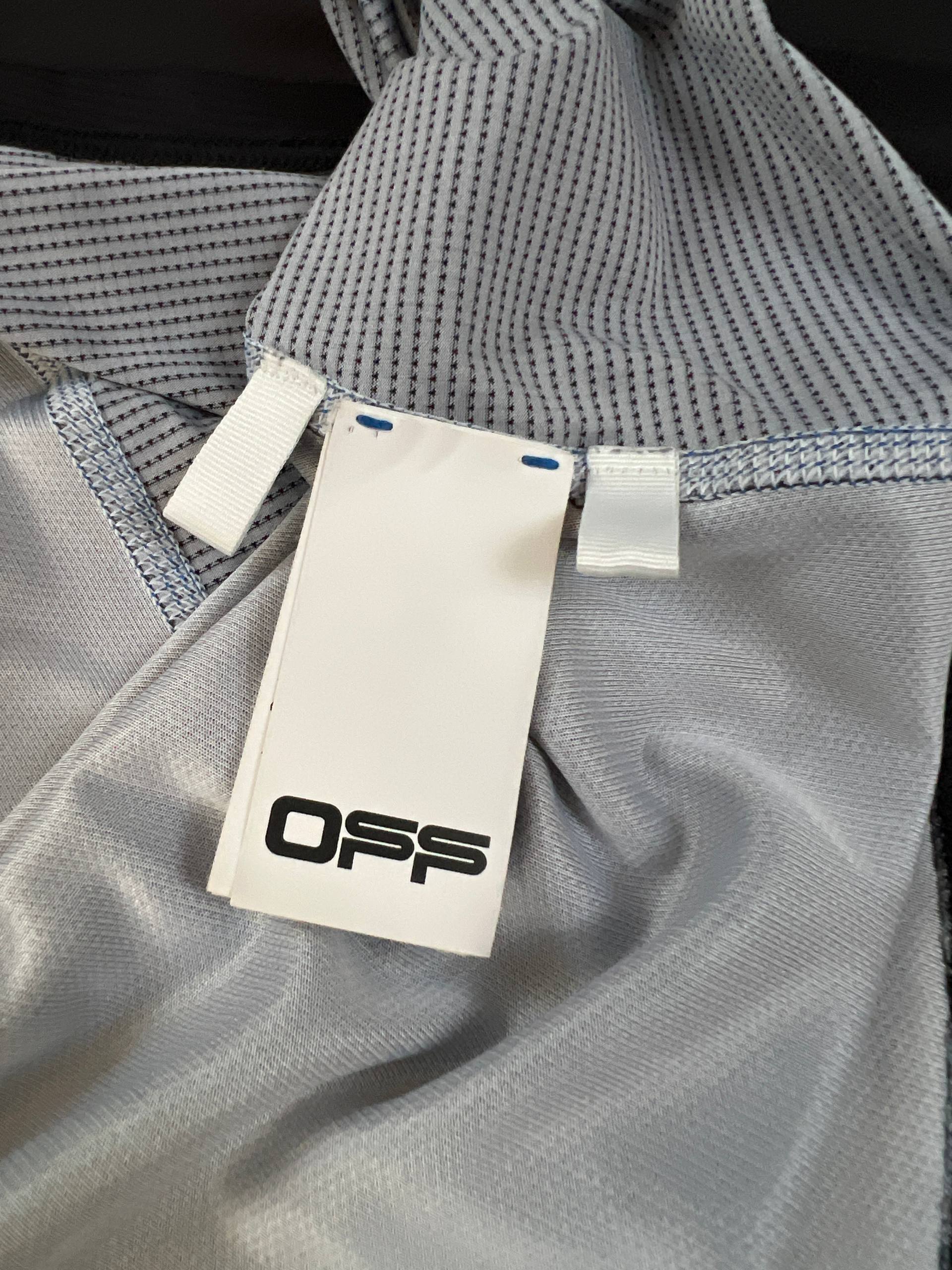 OFF black technical t-shirt with blue stitching and orange logo accents.