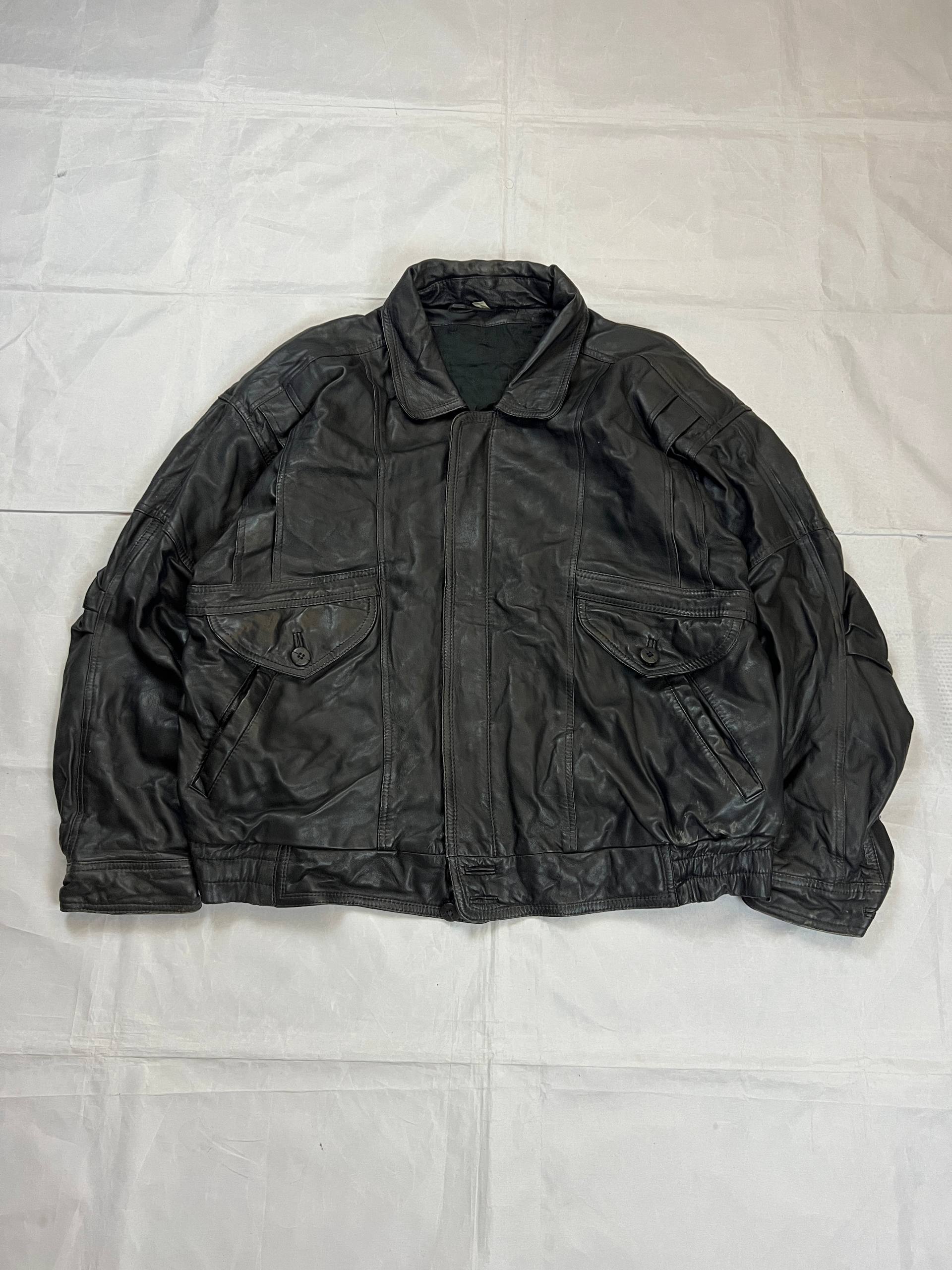 Bomber black leather bomber jacket with flap pockets and patterned lining.